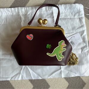 Coach Kisslock 16 in Black Currant with coach stickers